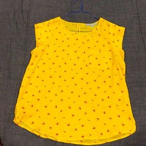 Cap sleeve yellow chiffon top with cherry print.